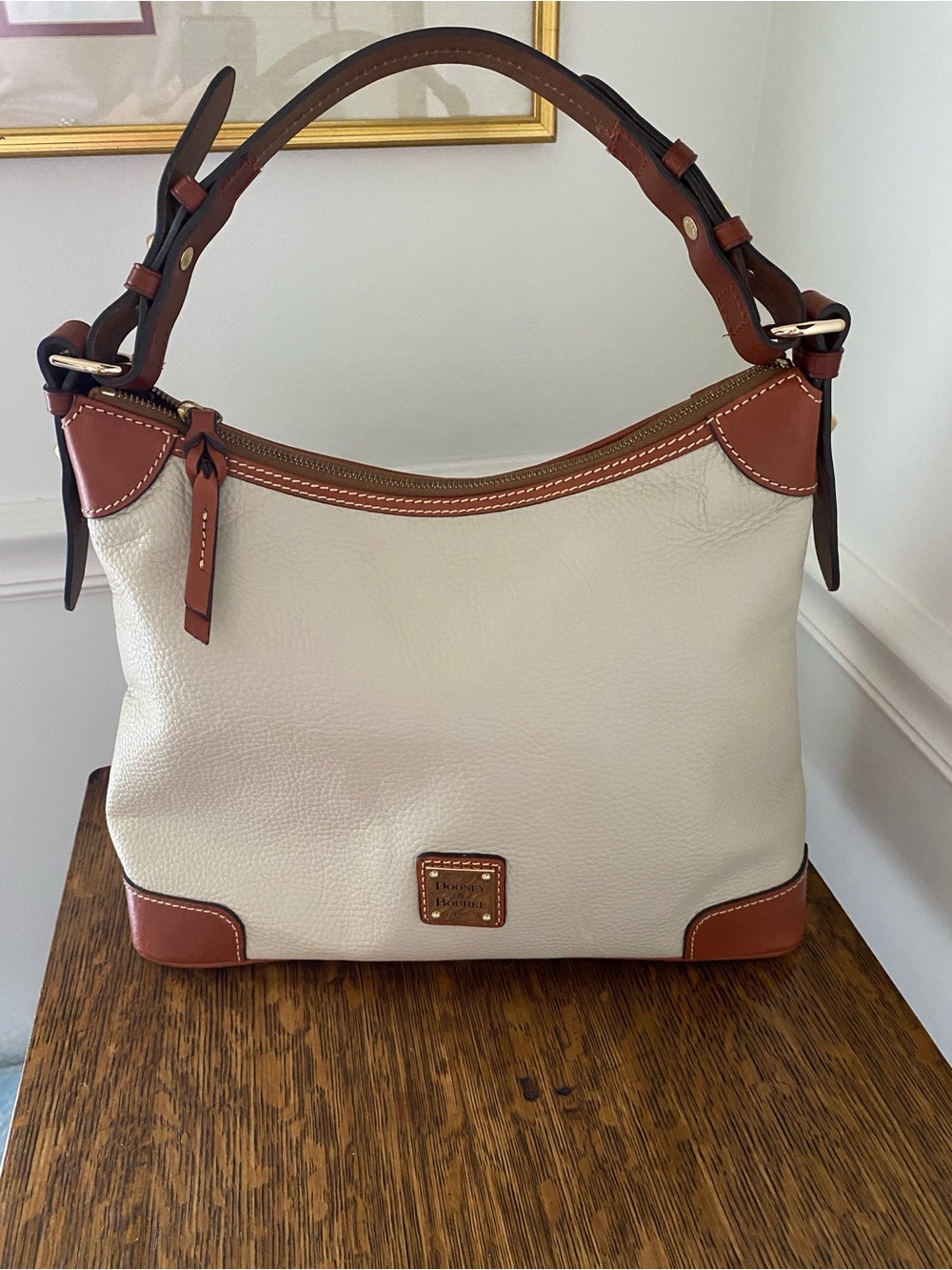 Dooney & Bourke Cream Leather Shoulder Bag with Brown Trim